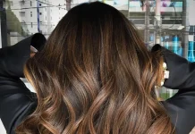 Lighten up dark long caramel balayage heir